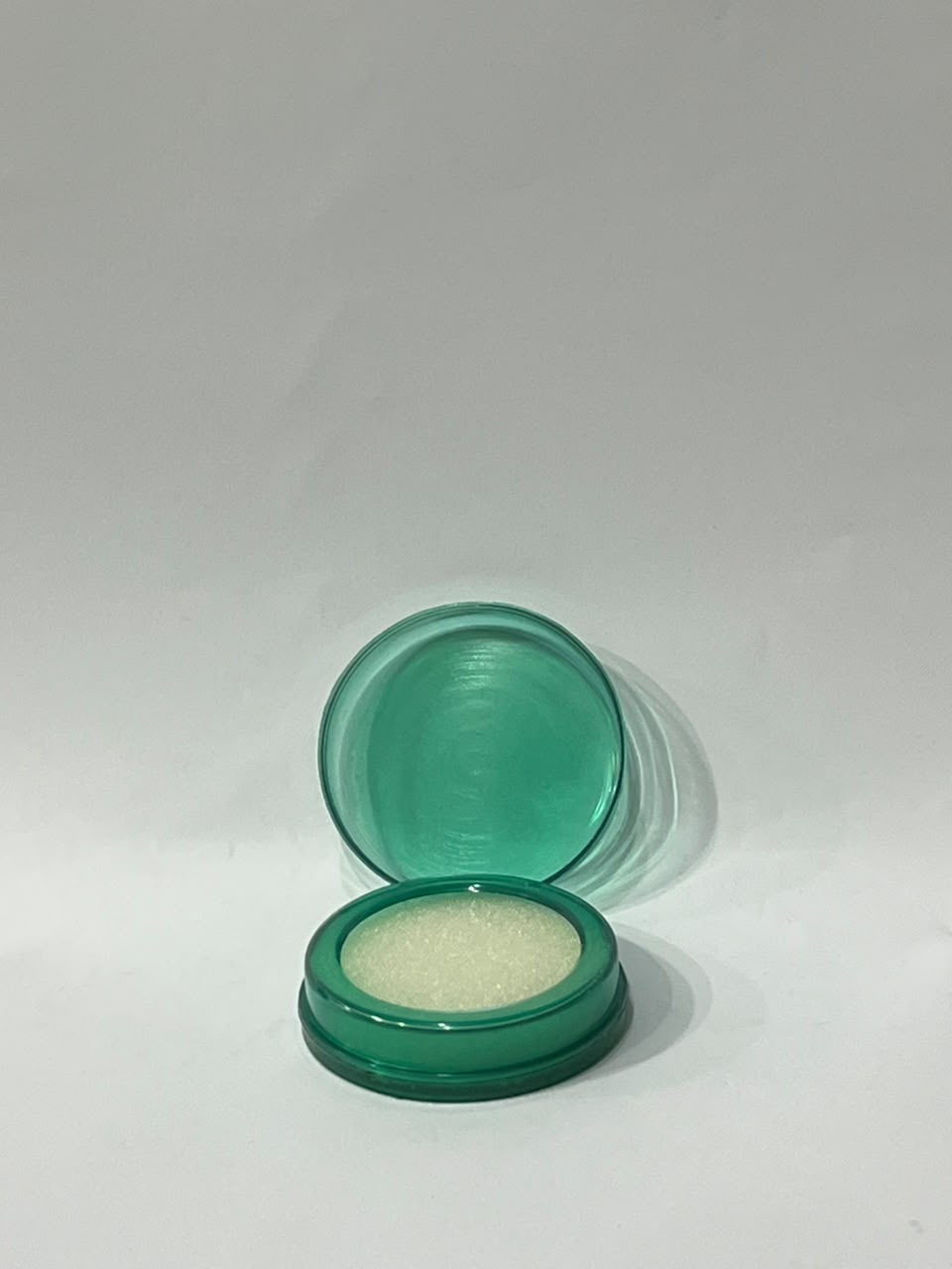 Green compact finger damper moistener open lid