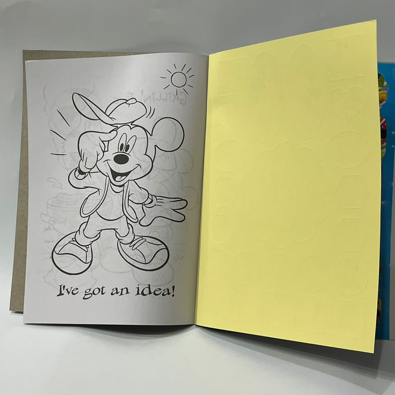 Mickey Mouse coloring book inside pages with Mickey I've got an idea illustration