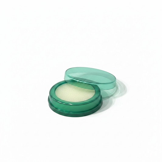 Green finger damper compact on white background